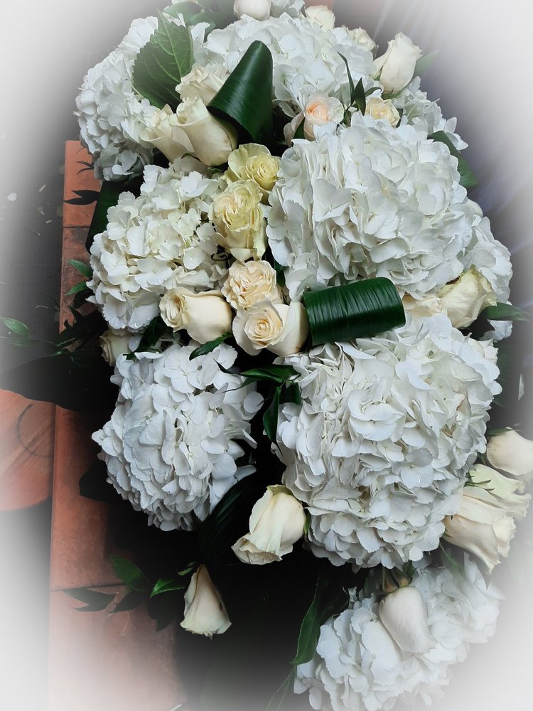 Coussin floral pour cercueil